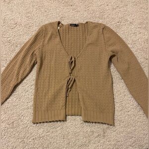 cute and coquette beige/tan top